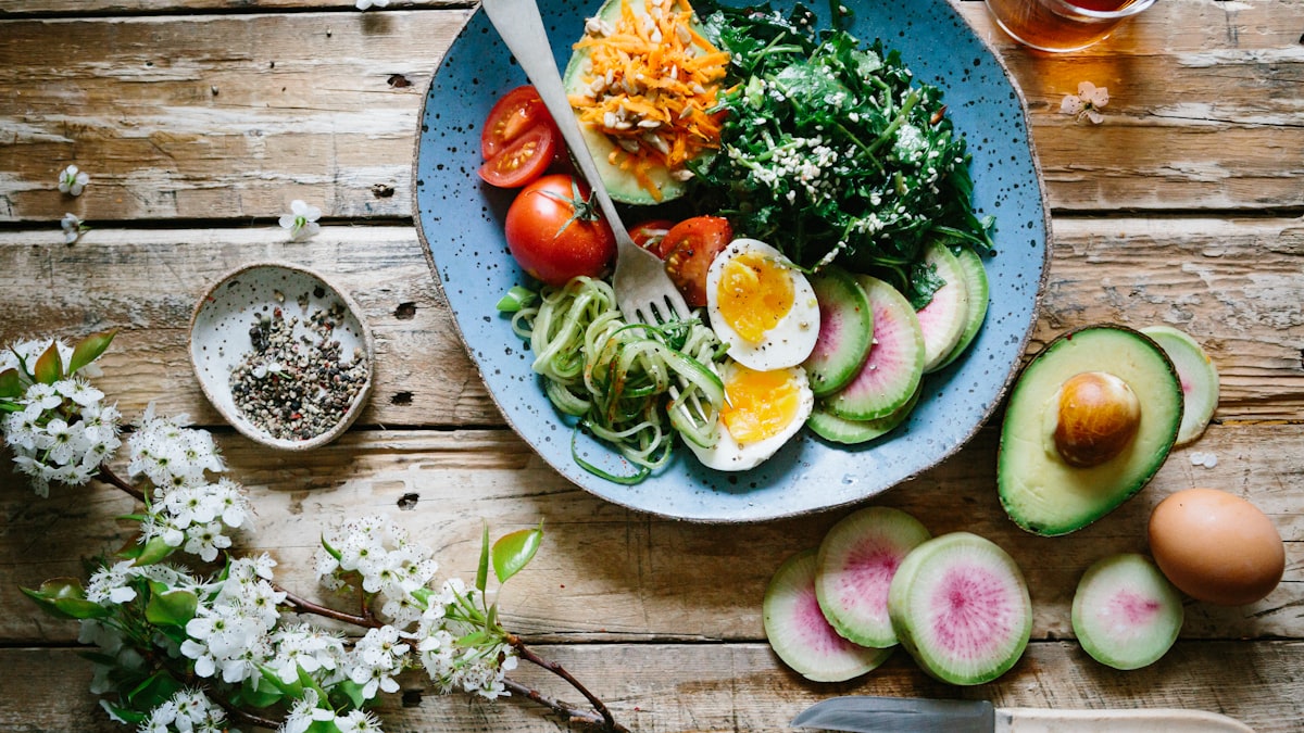 A colorful bowl of Indian vegetables, lentils and whole grains suited to a PCOS-friendly diet